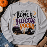 Hocus Pocus Halloween graphic long sleeve tee with cauldron, witch hat and spell books
