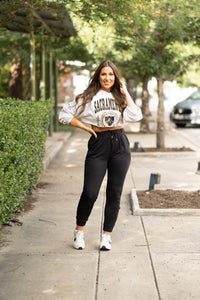 Women’s fleece-lined black joggers winter loungewear Soft black joggers with tapered leg and drawstring waist