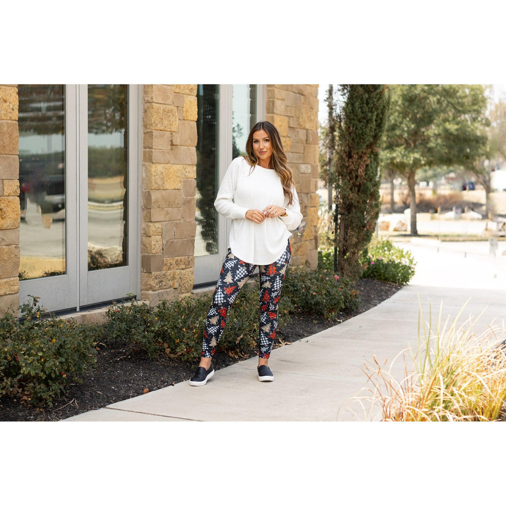 High-waisted Christmas leggings with pockets by Julia Rose.Close-up of Oh Christmas Tree buttery soft leggings fabric and detail