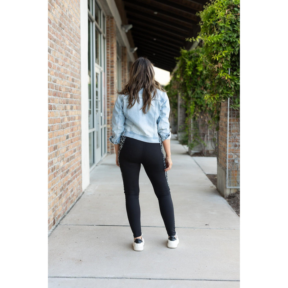 Snow leopard panel detail on  Buttery soft leopard panel leggings for women by Julia Rose