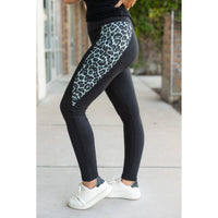 Snow leopard panel detail on  Buttery soft leopard panel leggings for women by Julia Rose