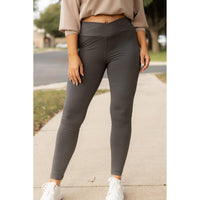 High-waisted charcoal crossover leggings with pockets by Julia Rose, Julia Rose women’s charcoal full length leggings lifestyle image