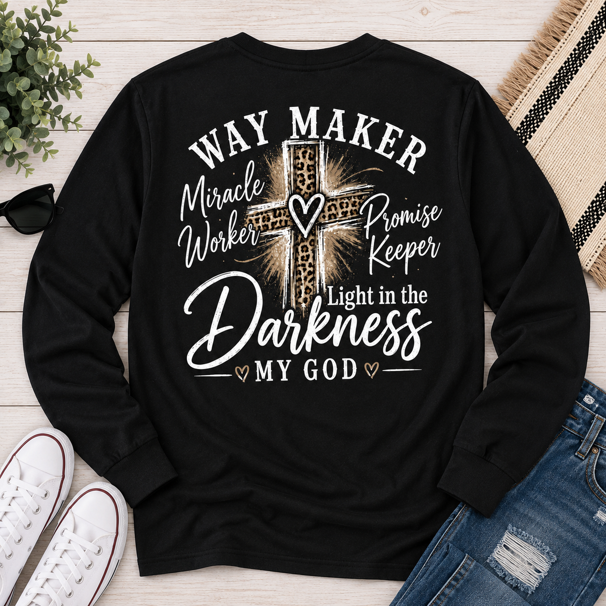 Black long sleeve crew neck tee with God heart front graphic and Way Maker leopard cross faith graphic on back