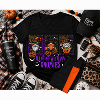 Julia Rose Hanging With My Gnomies apparel featuring three Halloween gnomes, pumpkins, bats and purple lettering.