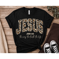 Black Jesus leopard-print John 14:6 graphic T-shirt displayed with chocolate-brown pocket leggings in a neutral year-round flat lay