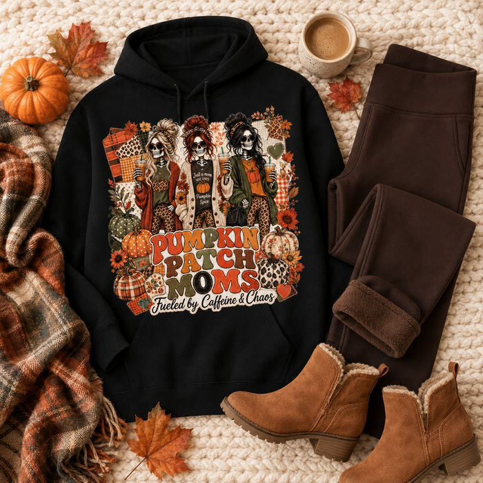 Pumpkin Patch Moms apparel with three skeleton moms, pumpkins and the phrase Fueled by Caffeine and Chaos, available in sizes S–3XL.