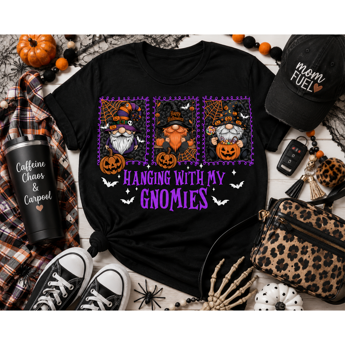 Julia Rose Hanging With My Gnomies apparel featuring three Halloween gnomes, pumpkins, bats and purple lettering.