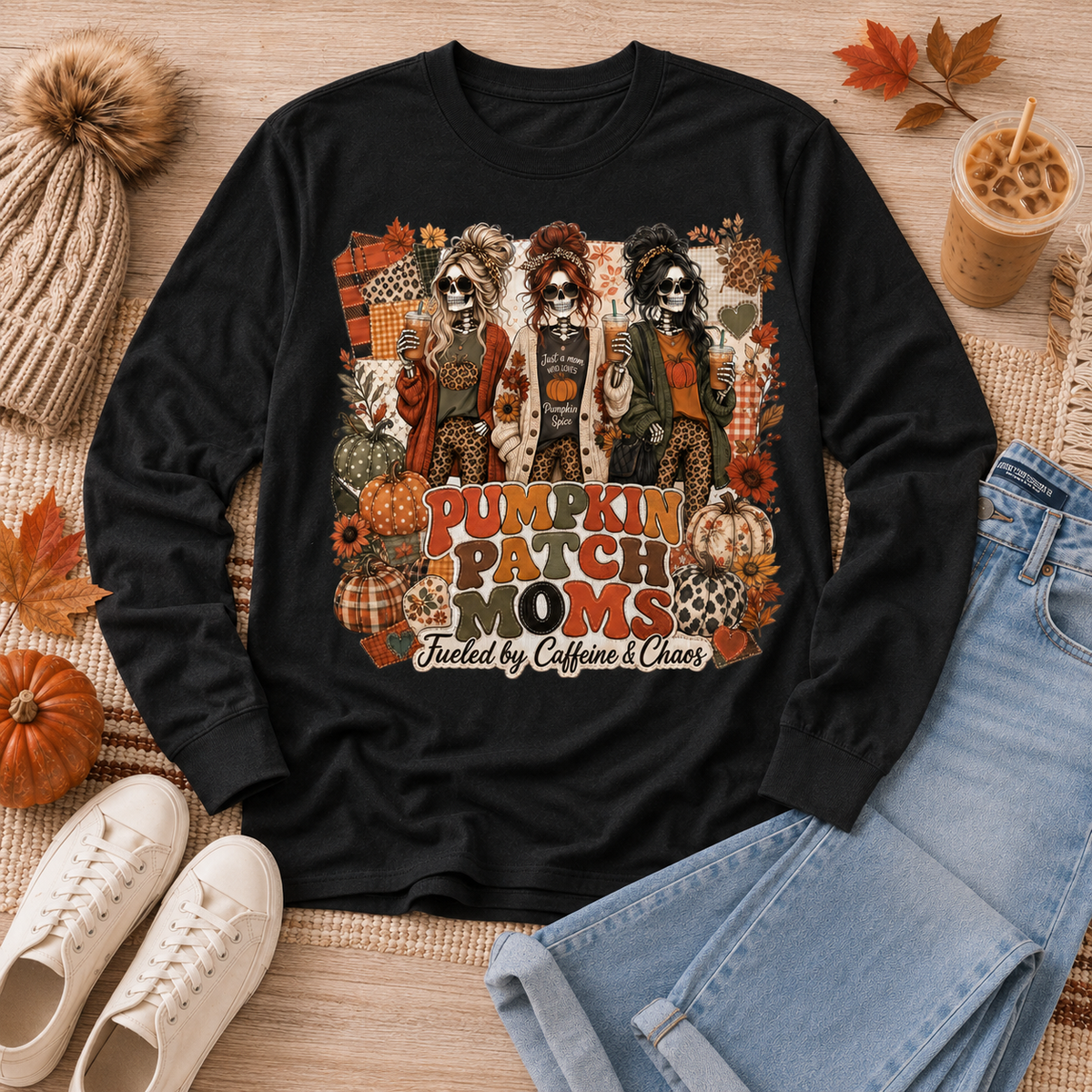Pumpkin Patch Moms apparel with three skeleton moms, pumpkins and the phrase Fueled by Caffeine and Chaos, available in sizes S–3XL.