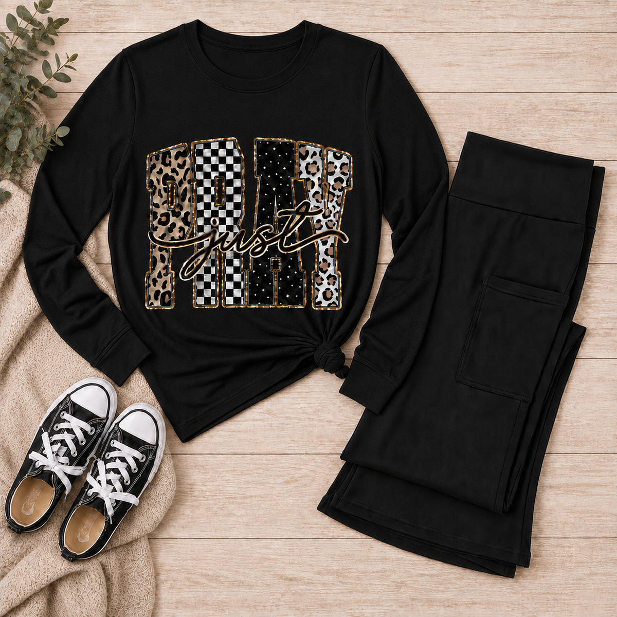 Julia Rose JUST PRAY apparel featuring leopard print, checkerboard and dotted lettering with gold-toned details.
