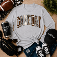 Julia Rose Game Day apparel featuring a football-inspired GAMEDAY graphic with leopard, polka-dot, gingham and striped details.