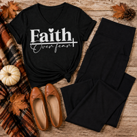 Julia Rose Faith Over Fear apparel featuring a white heart and cross design, available as a crewneck, V-neck, long-sleeve T-shirt and hoodie.