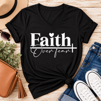 Faith Over Fear Christian inspirational graphic apparel featuring bold white Faith lettering, elegant Over Fear script, a small heart, and a cross design. Available in red and black in short sleeve crewneck, long sleeve crewneck, crewneck sweatshirt, and hoodie styles. Faith-based graphic clothing for women, everyday wear, church outfits, and inspirational gifts.