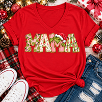 Christmas MAMA graphic shirt featuring pink and green patterned lettering, colorful holiday lights, and a Grinch-inspired character wearing a Santa hat.