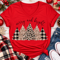 Merry and Bright Christmas graphic apparel featuring leopard print, buffalo plaid and glitter-inspired gold Christmas trees, available in three colors and four styles including crewneck tee, V-neck tee, sweatshirt and hoodie.