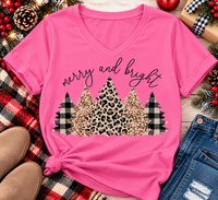Merry and Bright Christmas graphic apparel featuring leopard print, buffalo plaid and glitter-inspired gold Christmas trees, available in three colors and four styles including crewneck tee, V-neck tee, sweatshirt and hoodie.