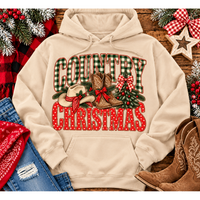 Country Christmas graphic tee with green plaid lettering, red polka dots, cowboy boots, western hat and festive Christmas bows.