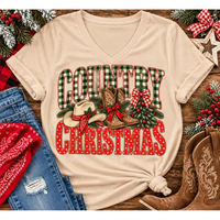 Country Christmas graphic tee with green plaid lettering, red polka dots, cowboy boots, western hat and festive Christmas bows.