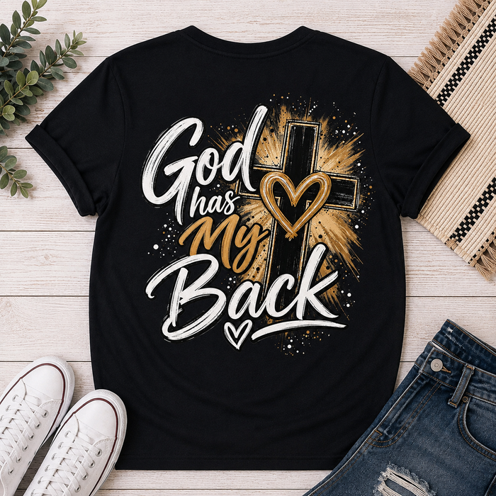 Back: Black God Has My Back Christian graphic tee featuring a bold black cross with white and brown lettering, heart details and distressed accents.