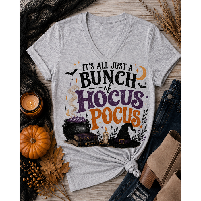 Gray Halloween graphic tee with It’s All Just a Bunch of Hocus Pocus lettering, cauldron, spell books, witch hat and bats.