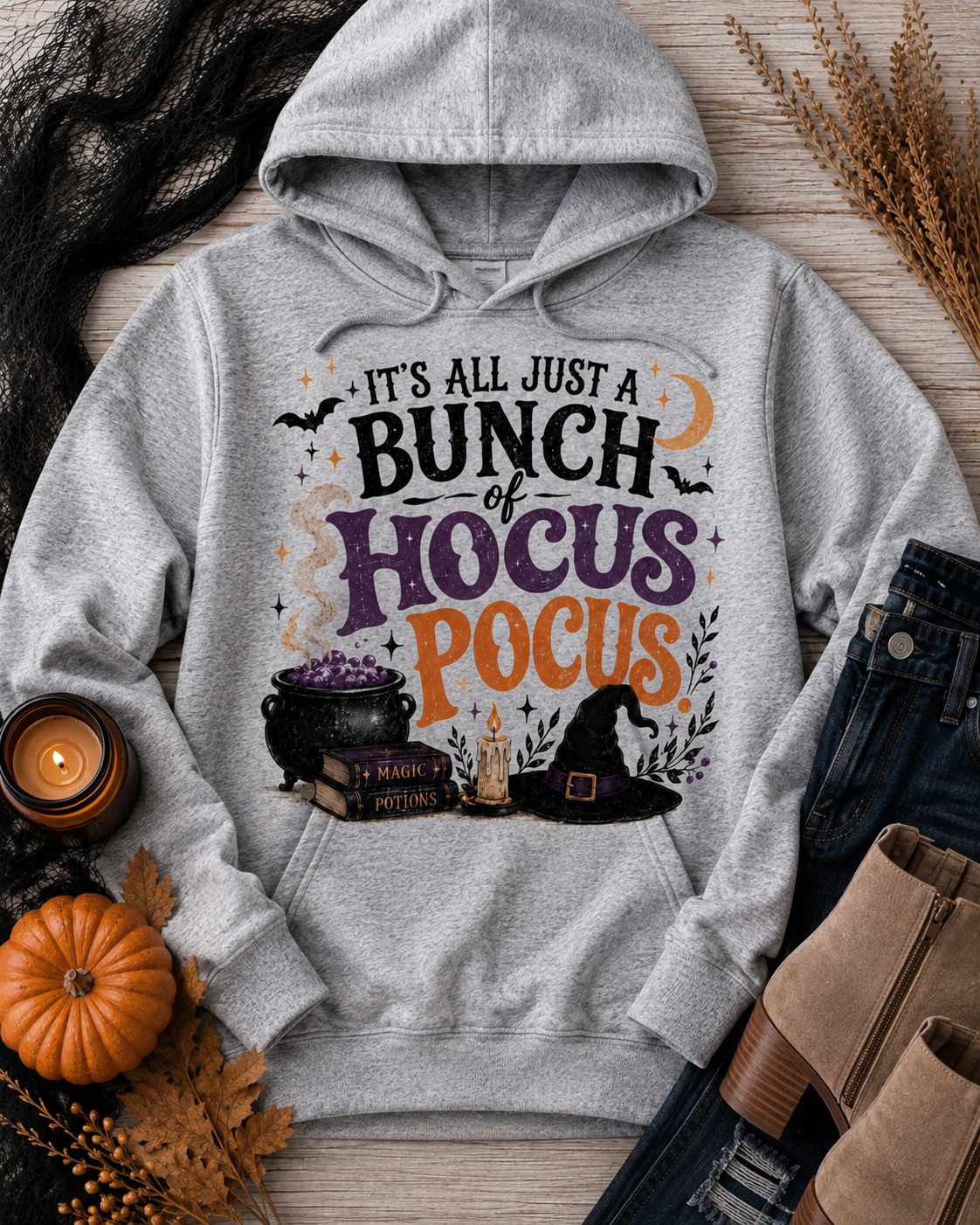 Hocus Pocus Halloween graphic hoodie featuring witch hat, cauldron, bats and spell books