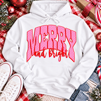 Merry and Bright Christmas graphic apparel with oversized pink polka dot lettering and festive holiday design