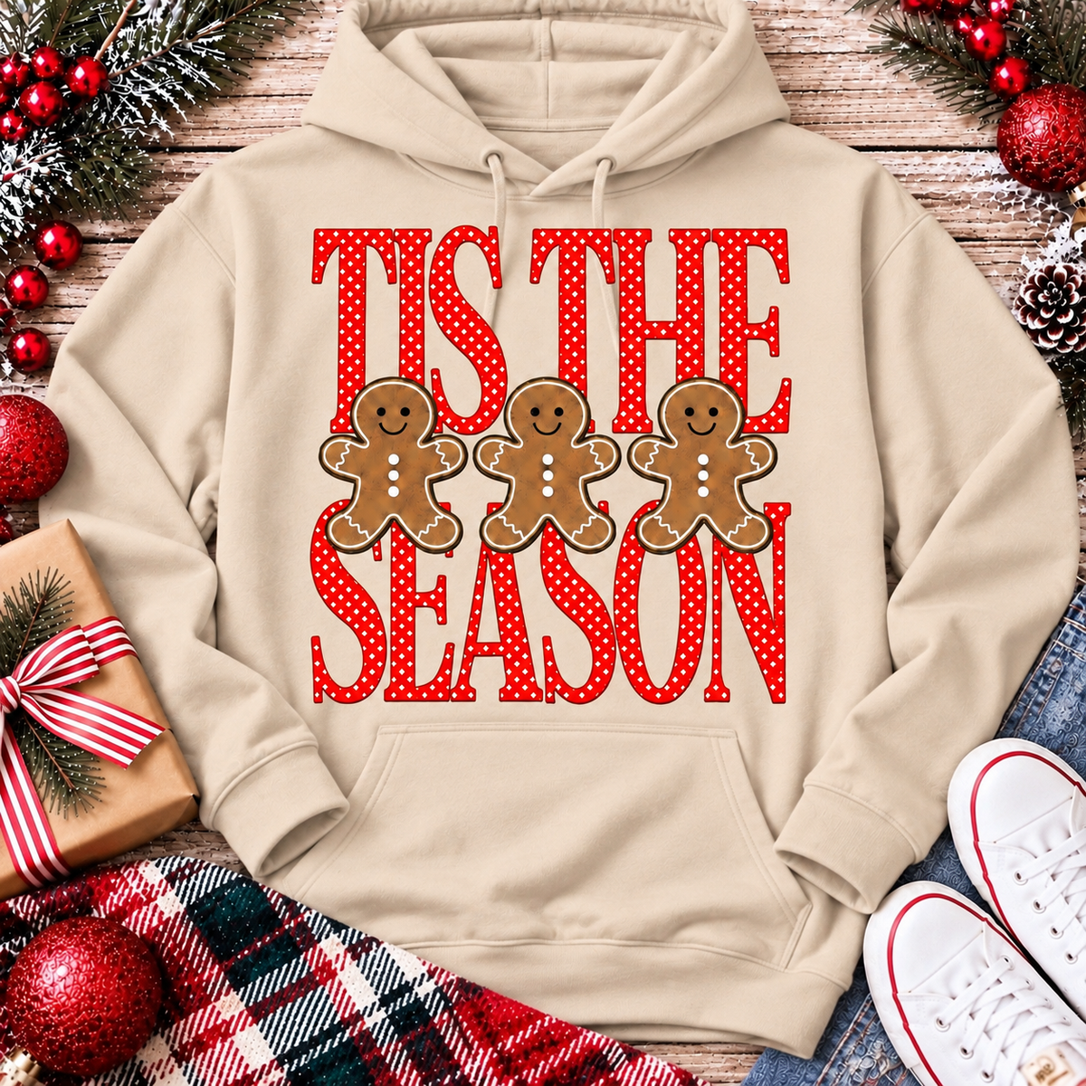 Tis the Season Christmas graphic apparel featuring red polka dot lettering and three gingerbread cookies