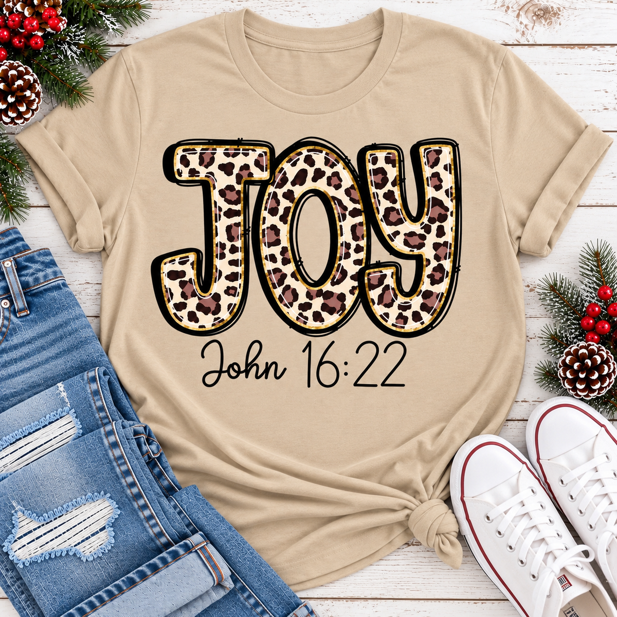 JOY John 16:22 leopard print Christmas graphic apparel available in four styles and two colors.